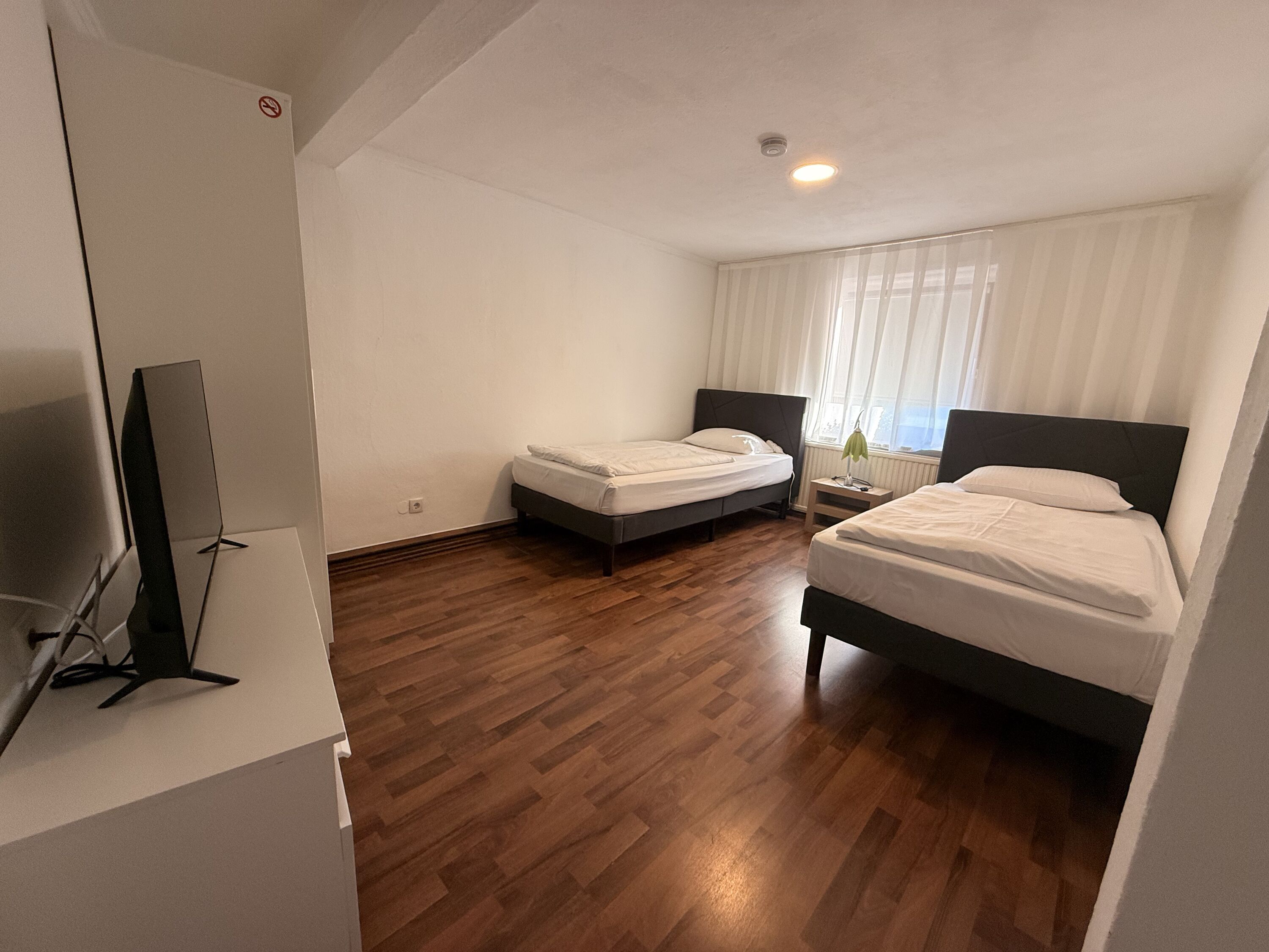 Zweibettzimmer mit getrennten Betten